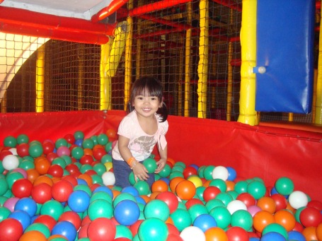 Zoe plays balls at Active Fun